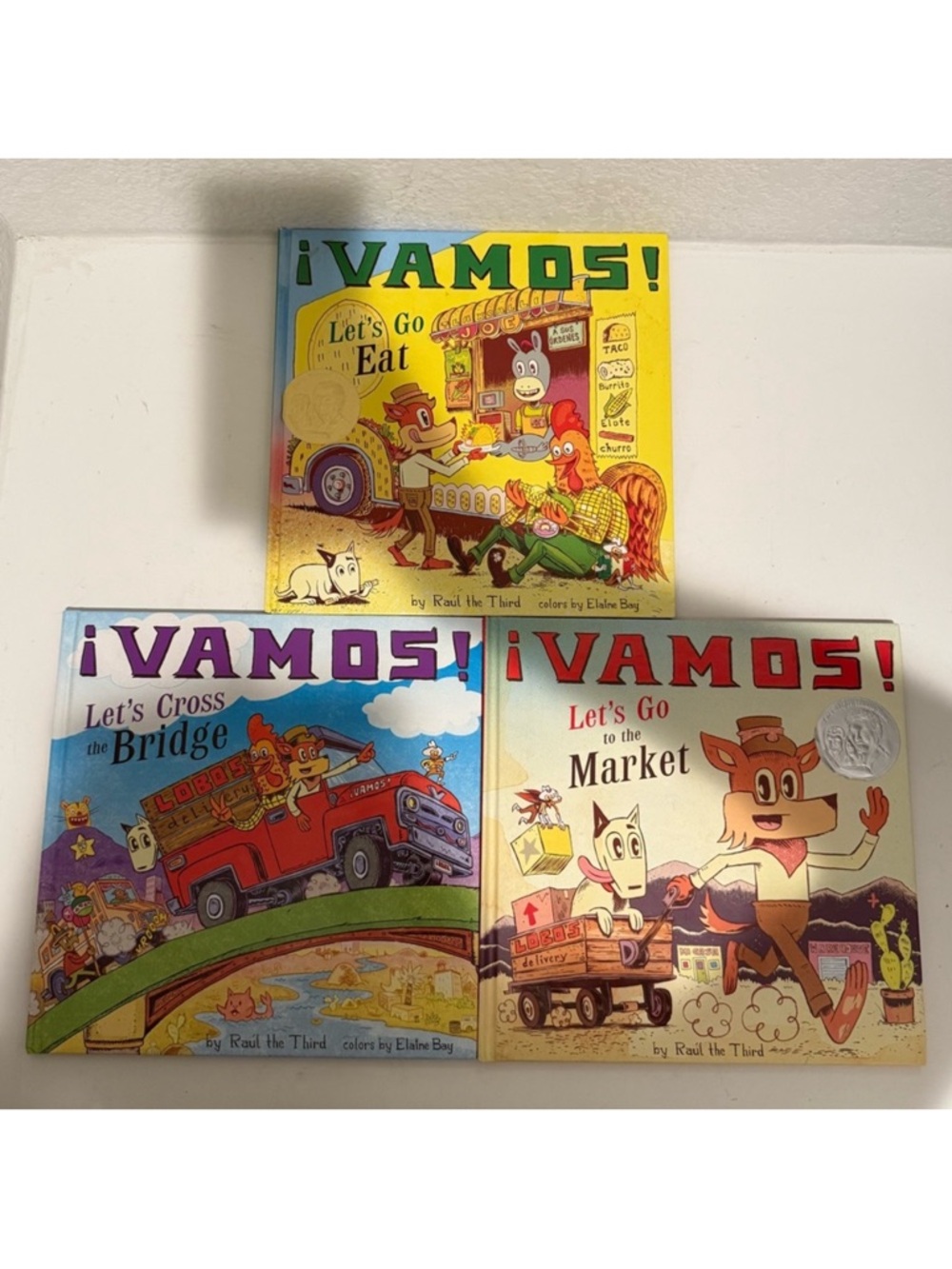 ¡VAMOS! Book Set: Let's Go to the Market, Let’s Cross the Bridge, Let’s Go Eat
